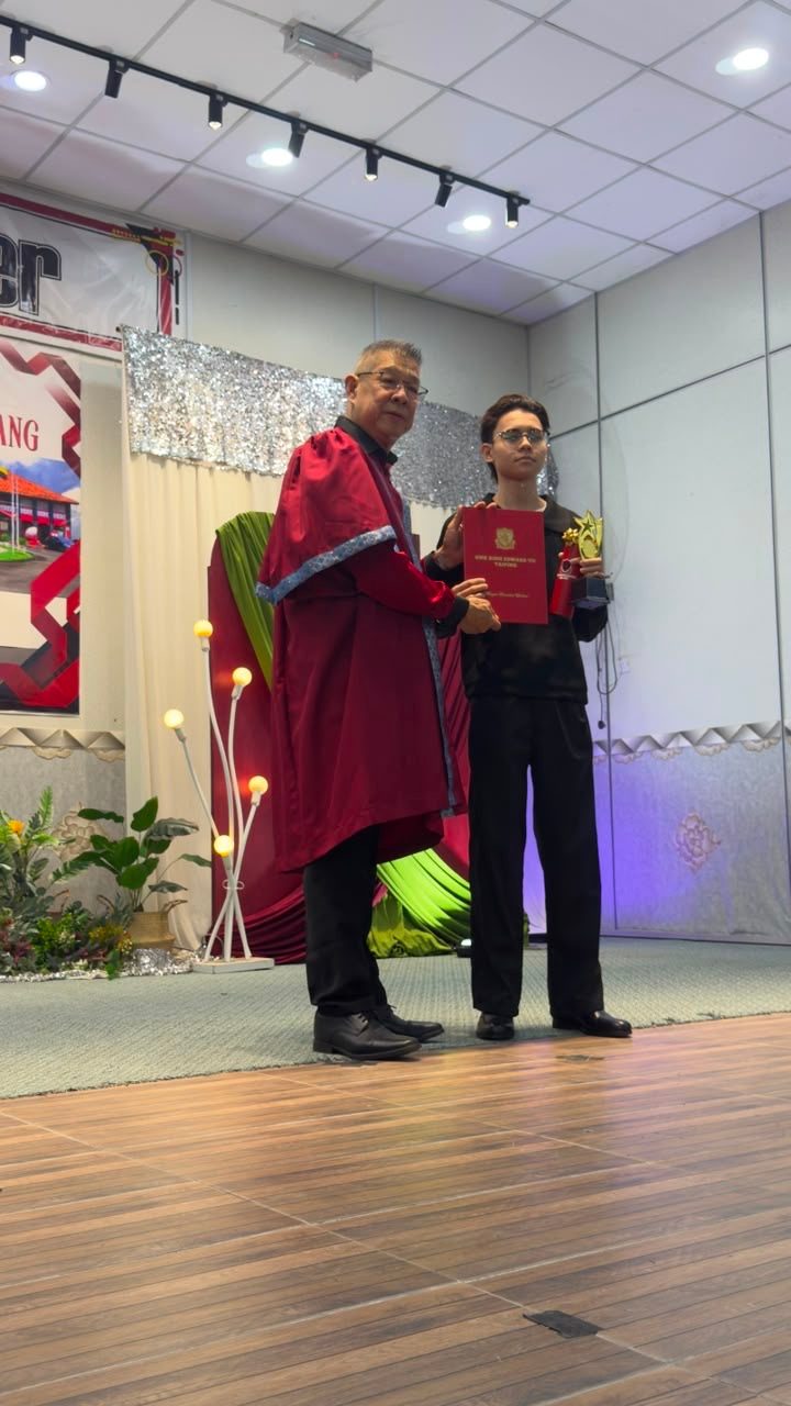 An Excellence Award presented to a student