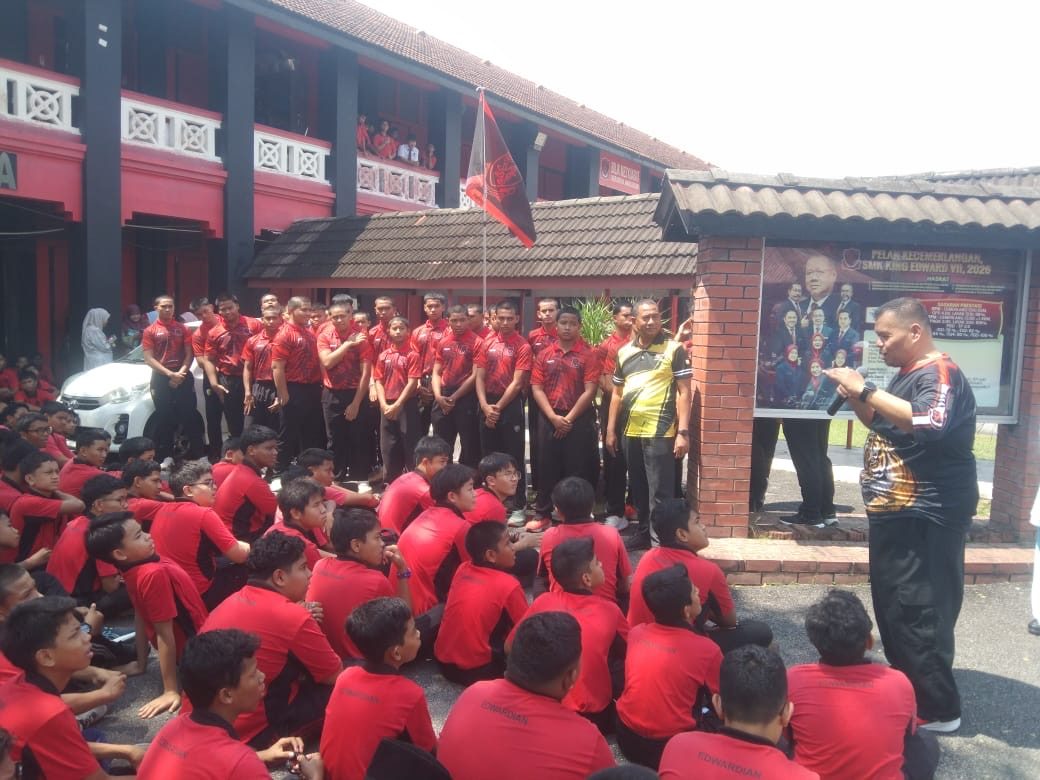 A briefing at the school before the trip to Stadium Merdeka