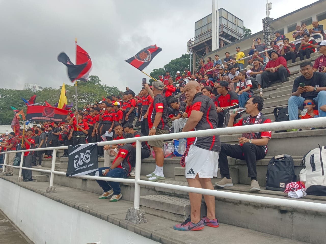 Old Edwardian supporters in the stands at Stadium Merdeka